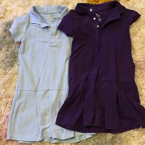 Lot of two Primary uniform dresses